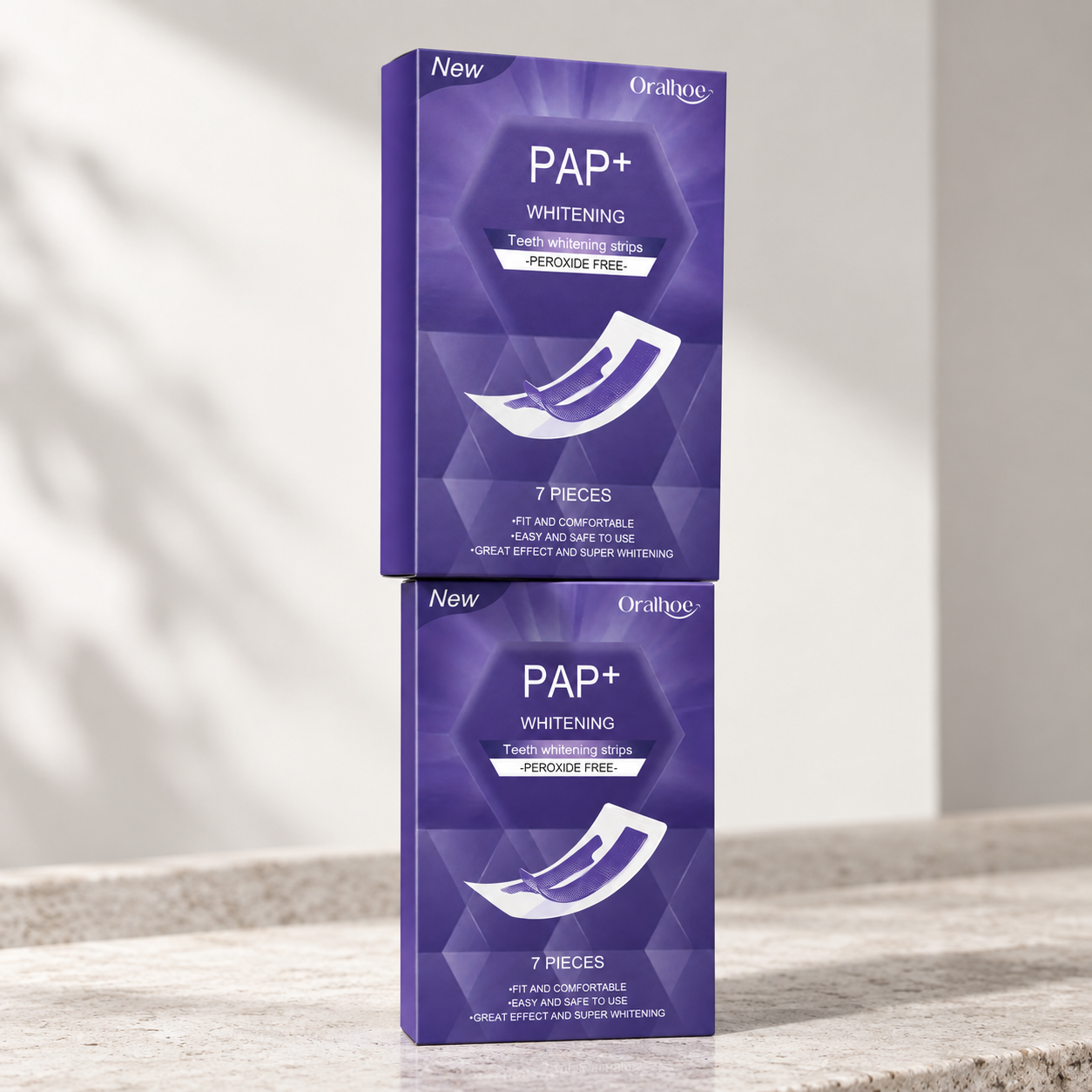 Två förpackningar DentalStrips whitening strips på badrumsbänk